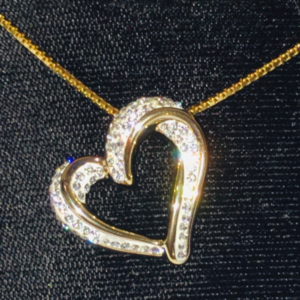 JCM Twisted Heart Necklace Dripping in Inlaid CZ